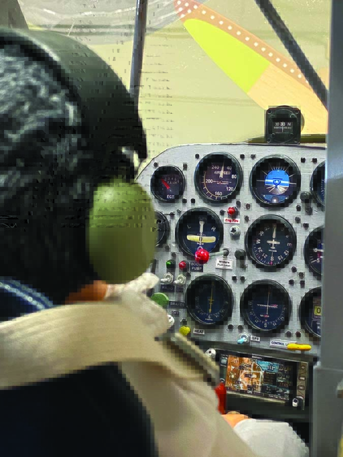 This thin plywood face has cutouts for the instruments.